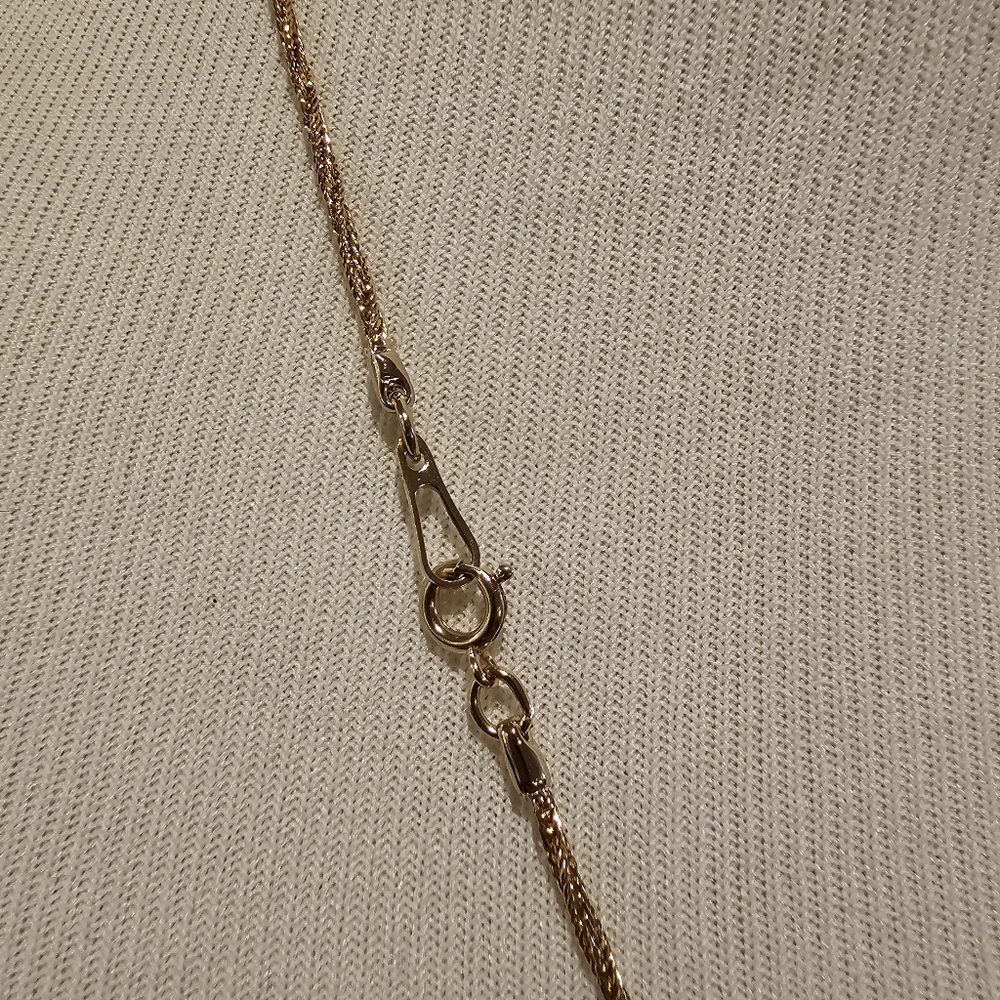 Goldtone filigree elephant pendant on a twisted goldtone chain - Picture 3 of 3